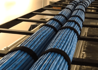 Big rolls of blue cables with black ropes